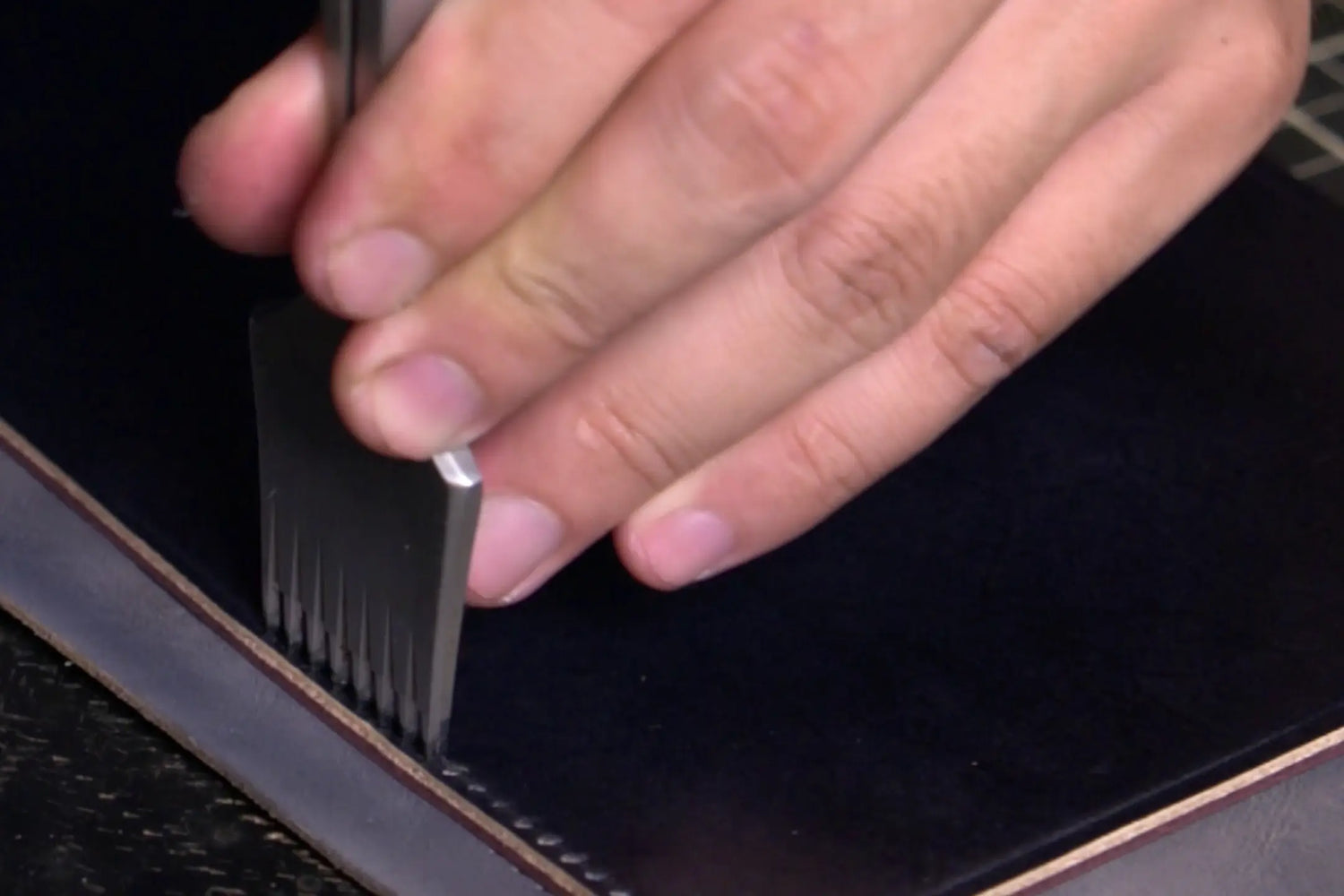 Punching holes in leather