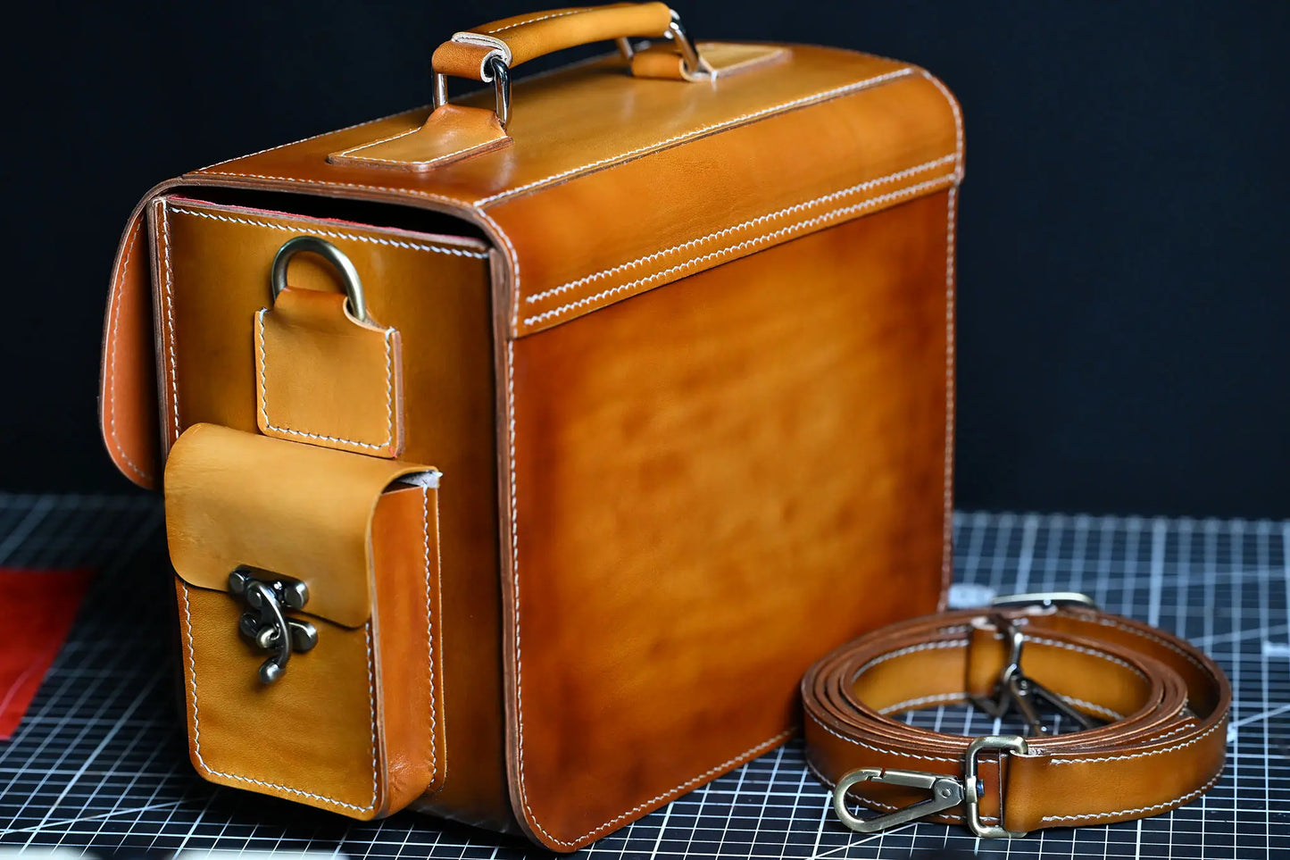 Large handcrafted light-brown leather camera bag-The back of the bag