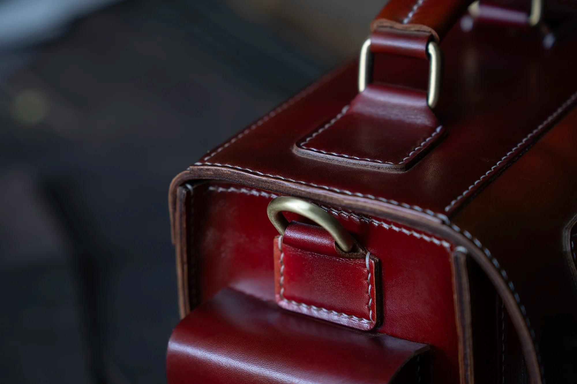 Close-up of brass hardware on handmade leather camera bag – TDN Leather